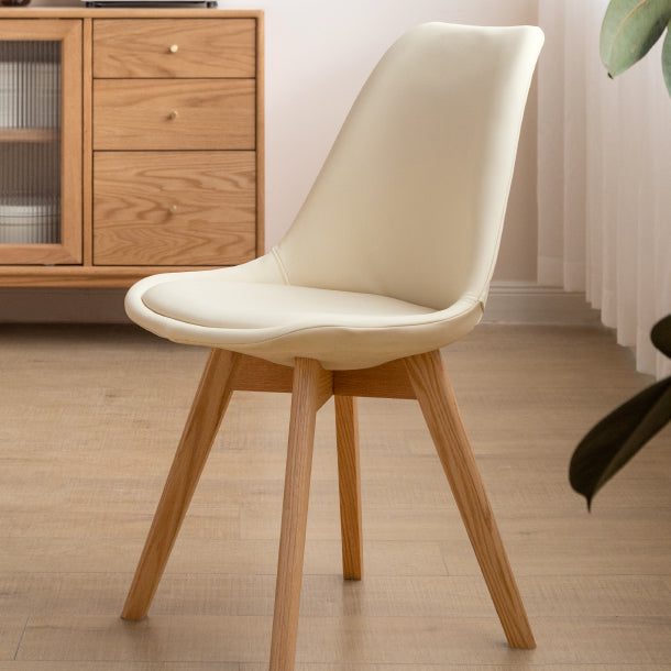 Eames 奶油風科技皮軟墊實木餐椅