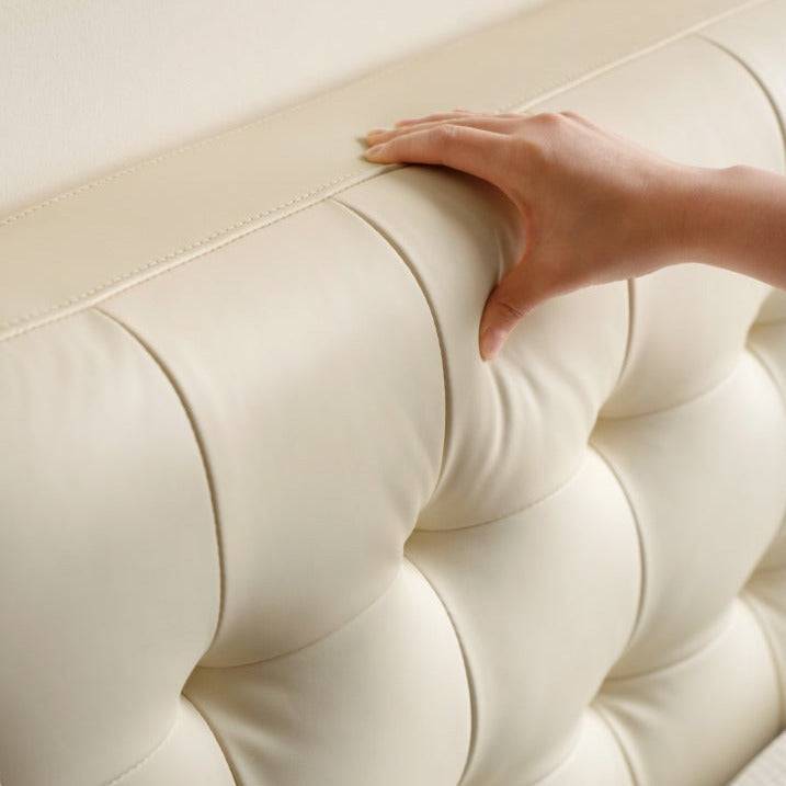 Creamy Upholstered Bed with light