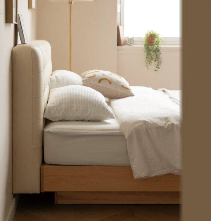 Creamy Upholstered Bed with light